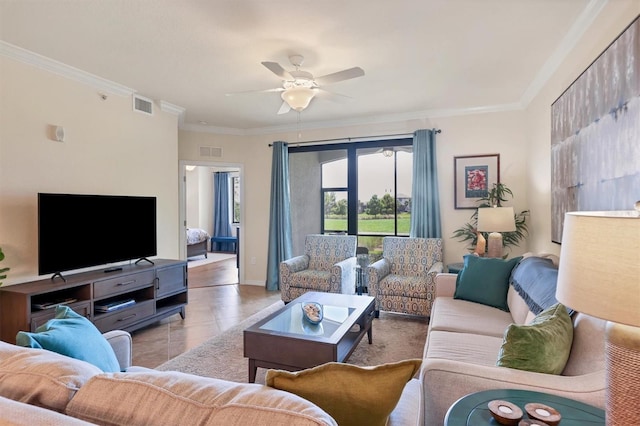 tiled living room with crown molding and ceiling fan