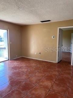 view of tiled empty room