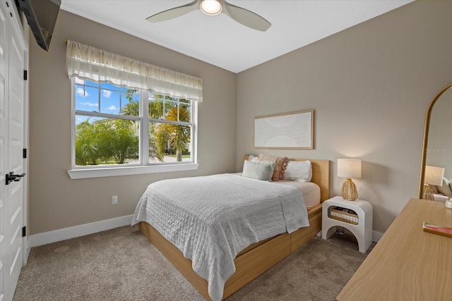 bedroom with light colored carpet and ceiling fan