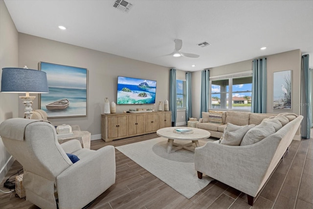 living room with ceiling fan