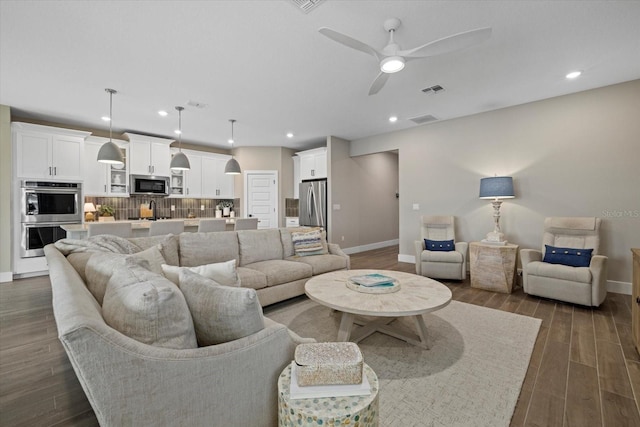 living room with ceiling fan