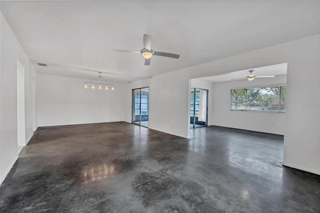 unfurnished room featuring ceiling fan