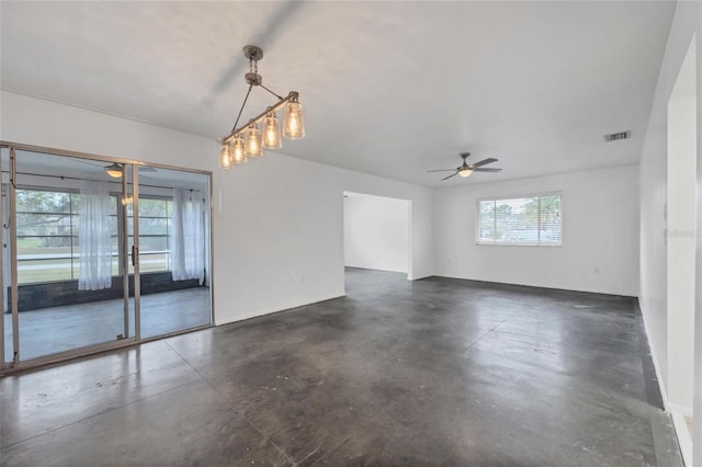 spare room with ceiling fan