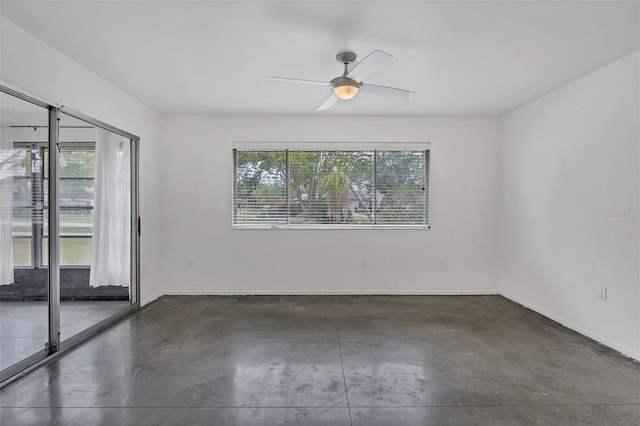 unfurnished room featuring ceiling fan