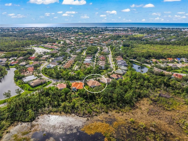 aerial view featuring a water view