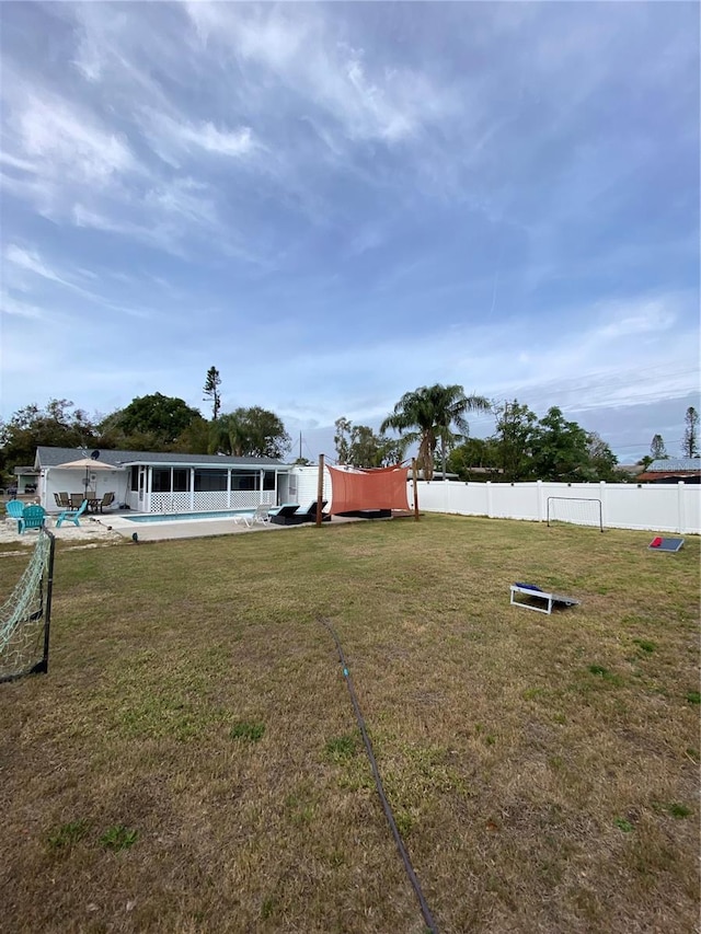 view of yard with a swimming pool