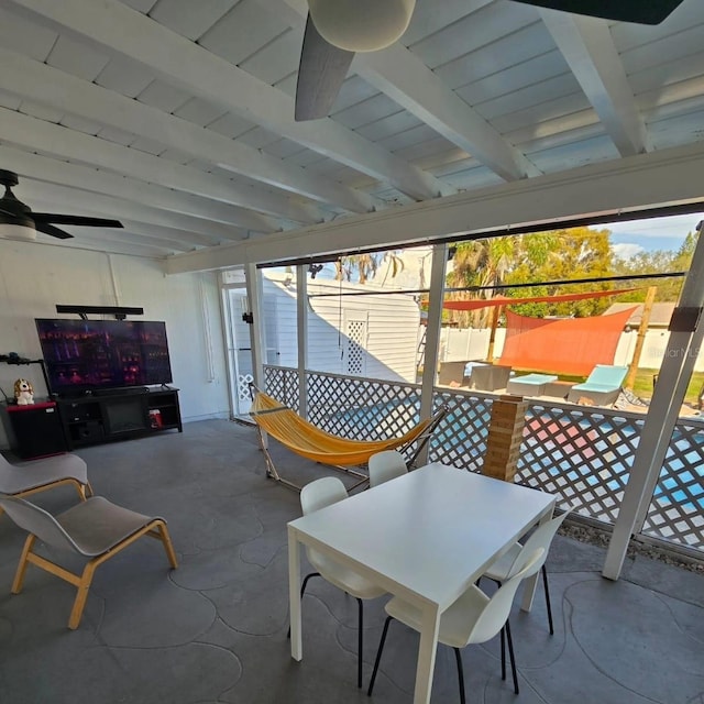 view of patio featuring ceiling fan