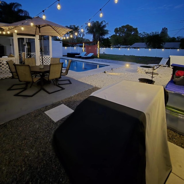 view of pool featuring a jacuzzi and a patio