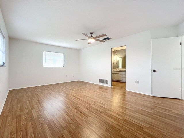 unfurnished room with light hardwood / wood-style flooring and ceiling fan