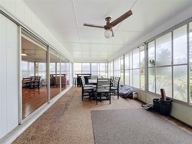 sunroom / solarium with ceiling fan