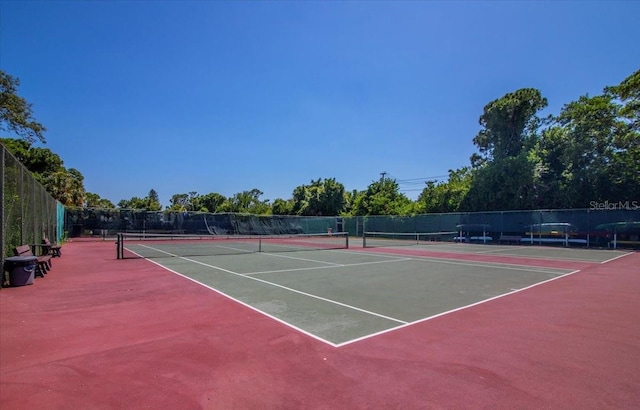 view of tennis court with basketball court