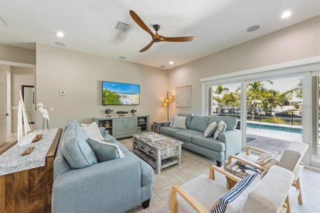 living room featuring ceiling fan