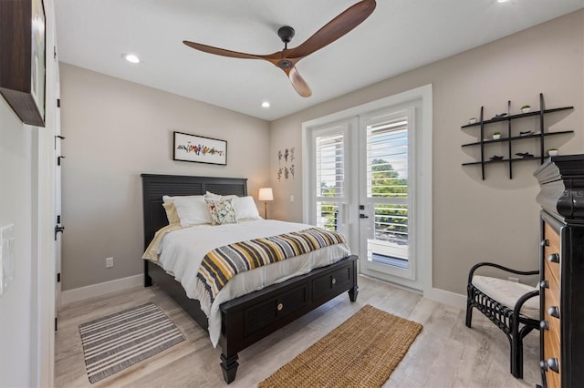 bedroom with ceiling fan, light wood-type flooring, and access to outside