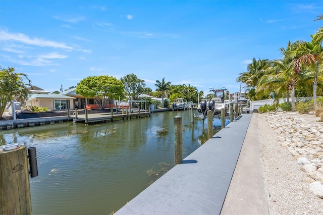 view of dock with a water view