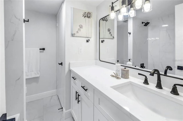 bathroom with vanity and walk in shower