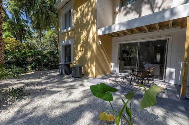 exterior space featuring a patio area and central AC unit