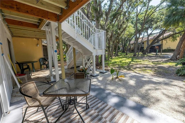 wooden deck featuring a patio area