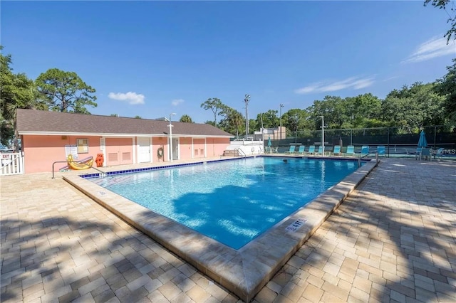 view of pool featuring a patio area