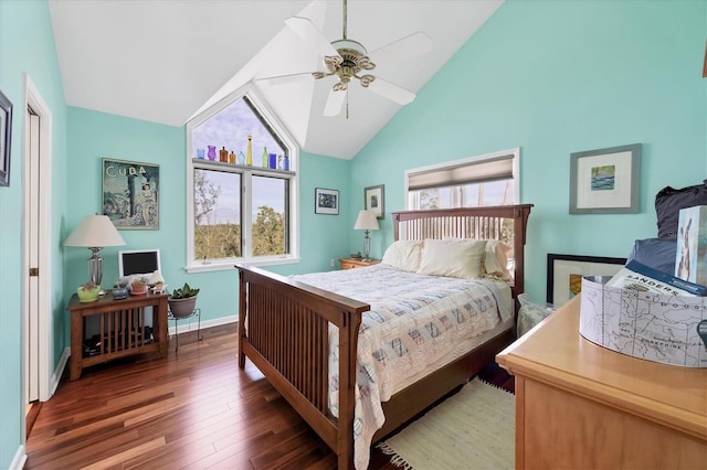 bedroom featuring ceiling fan, dark hardwood / wood-style flooring, and lofted ceiling