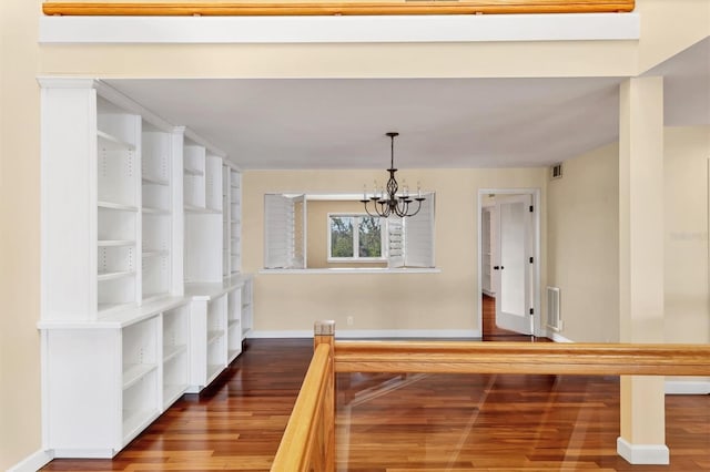16 Tidy Island Blvd Unit 16, Bradenton, FL 34210 - hall with wood finished floors, baseboards, and a chandelier