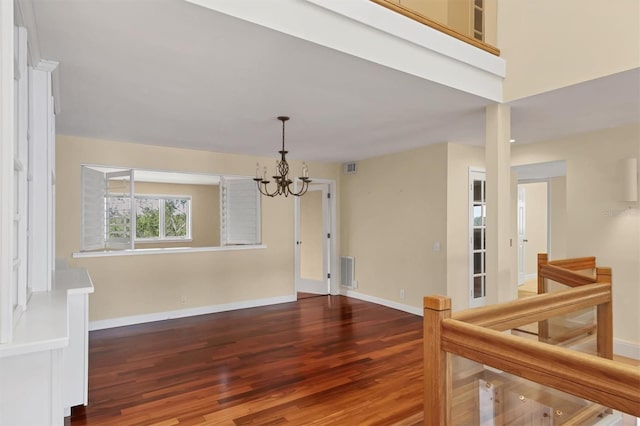 16 Tidy Island Blvd Unit 16, Bradenton, FL 34210 - foyer entrance with wood finished floors, a chandelier, and baseboards