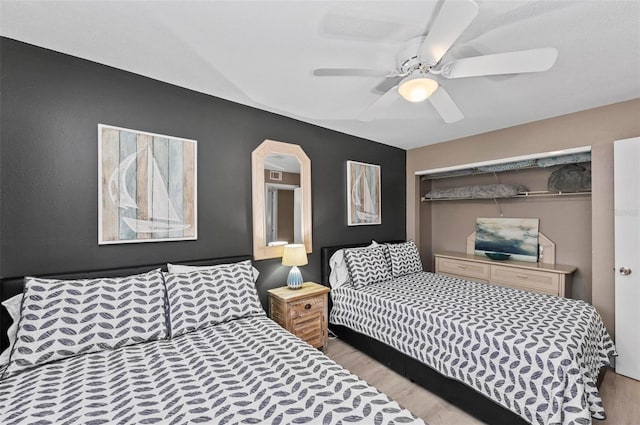 bedroom featuring a closet and ceiling fan