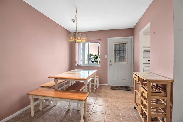 dining room featuring an inviting chandelier