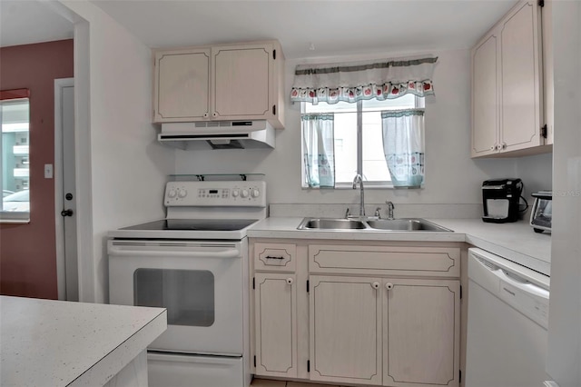 kitchen with white appliances and sink