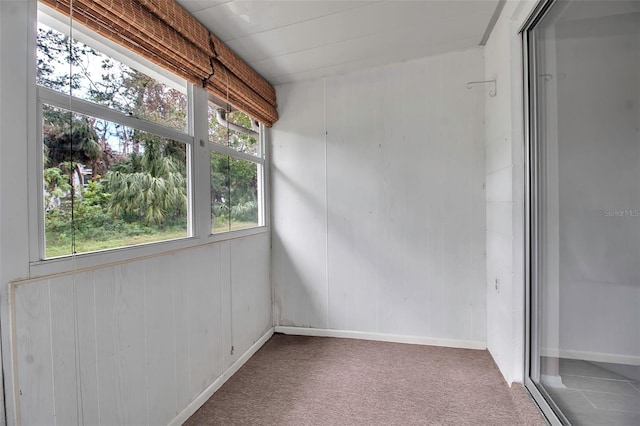 unfurnished sunroom with plenty of natural light