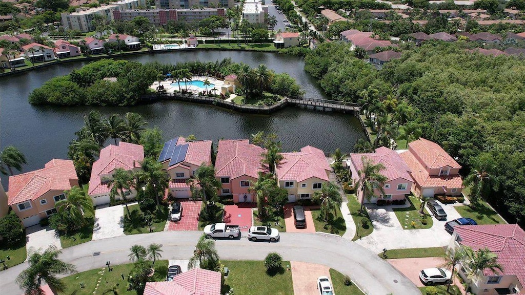 bird's eye view with a residential view and a water view