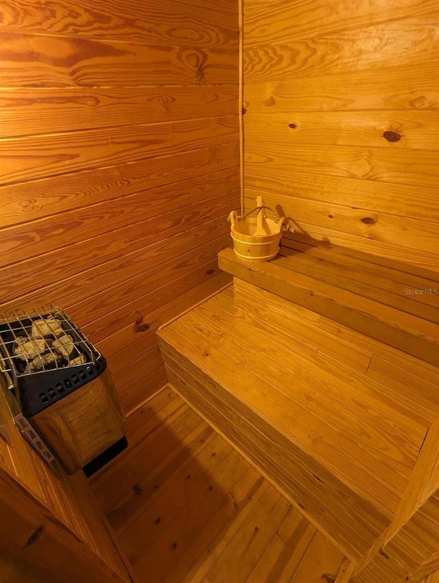 view of sauna featuring hardwood / wood-style flooring