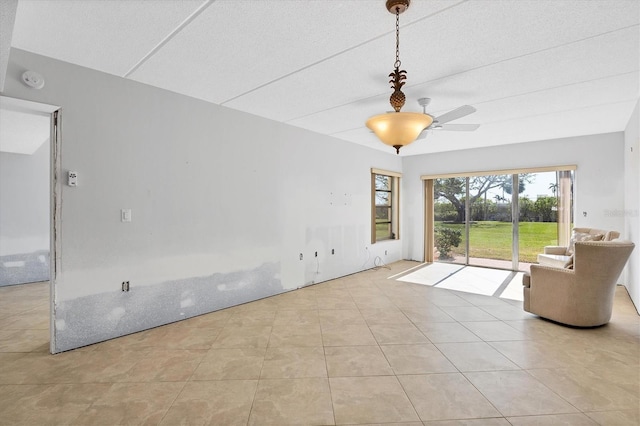 unfurnished living room with light tile patterned floors