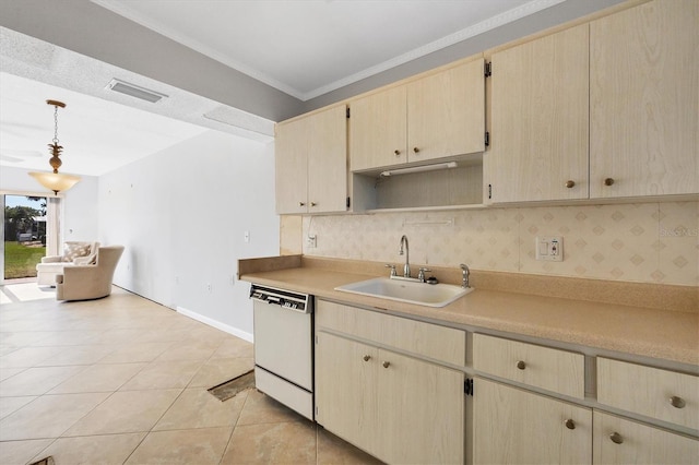 kitchen with dishwasher, sink, hanging light fixtures, light tile patterned floors, and light brown cabinets