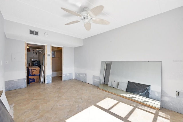 interior space featuring ceiling fan