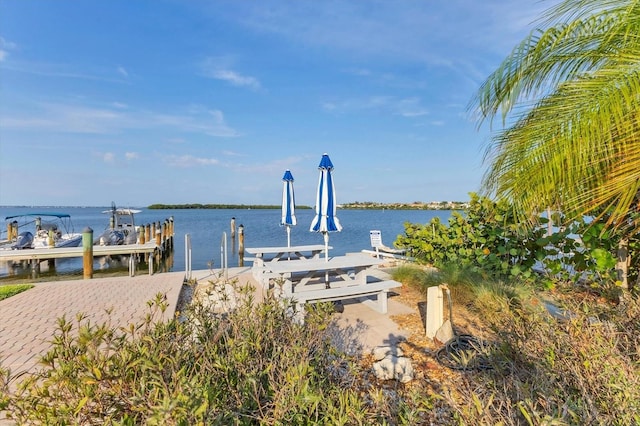 view of dock with a water view