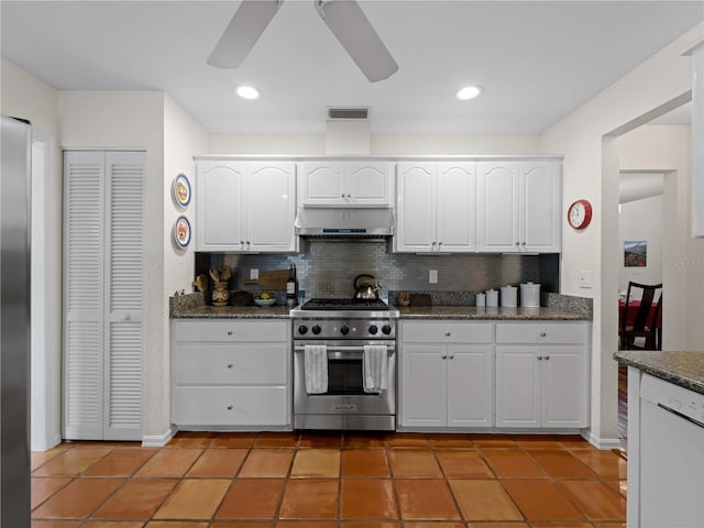 kitchen featuring ceiling fan, tasteful backsplash, light tile patterned flooring, white cabinets, and appliances with stainless steel finishes