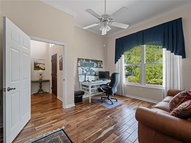 office with ceiling fan, wood-type flooring, and ornamental molding