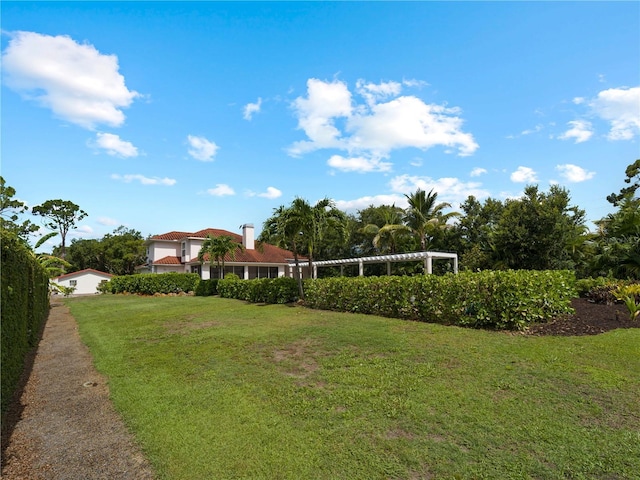 view of yard with a pergola