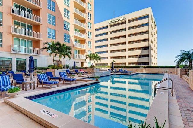 view of swimming pool with a patio area