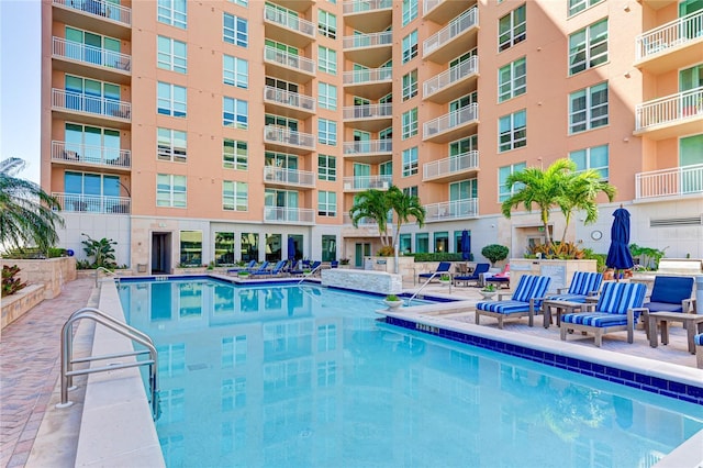 view of swimming pool with a patio area