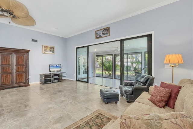 living room featuring crown molding and ceiling fan