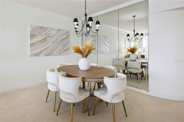 dining space featuring carpet flooring, a chandelier, and ornamental molding