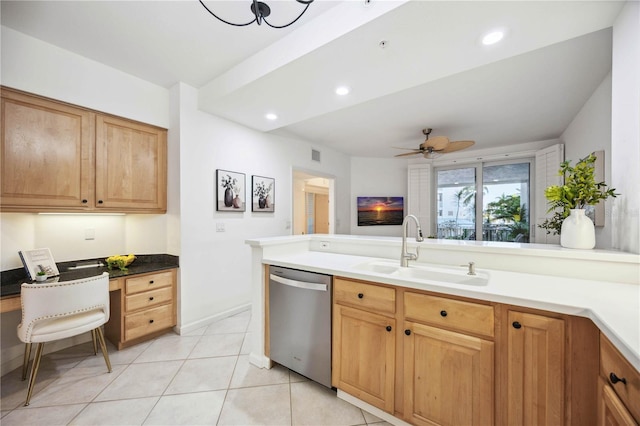 kitchen with stainless steel dishwasher, ceiling fan, light tile patterned floors, and sink