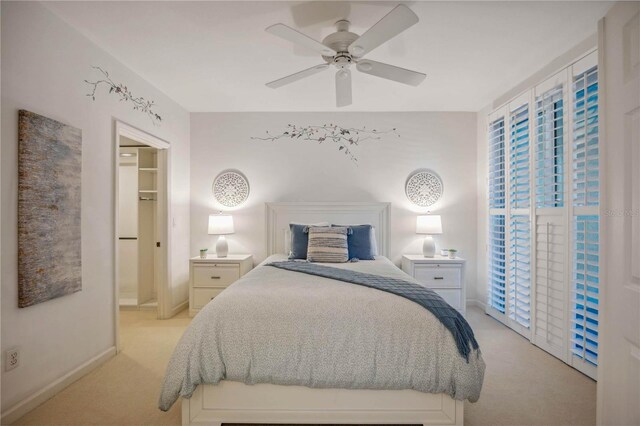 bedroom featuring access to exterior, ceiling fan, and light carpet