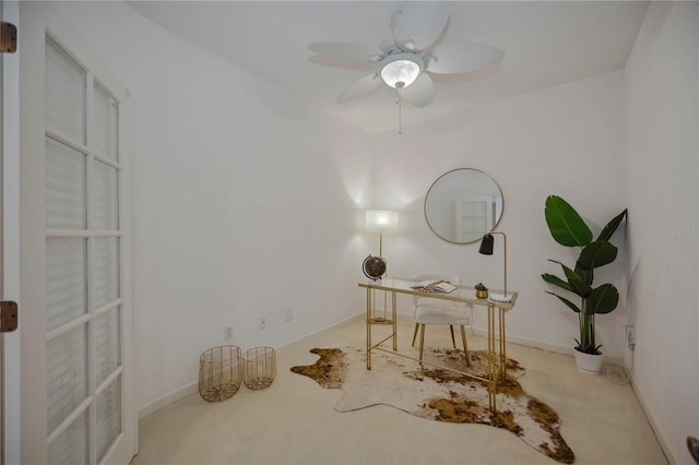 office featuring carpet flooring and ceiling fan