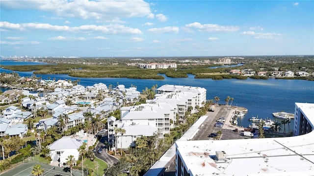 bird's eye view with a water view