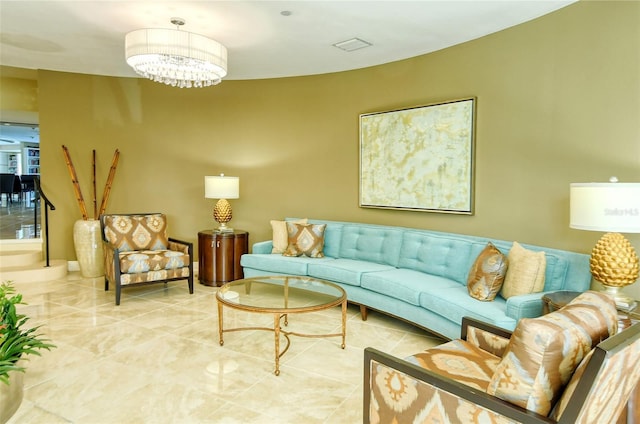 living room with an inviting chandelier