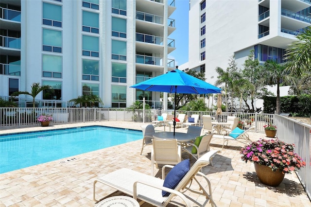 view of pool featuring a patio