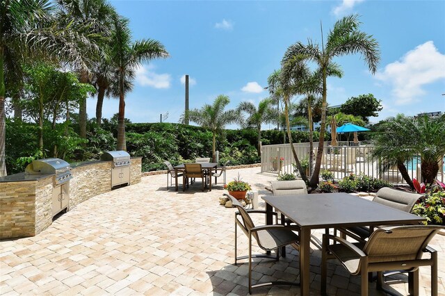 view of patio with grilling area and exterior kitchen