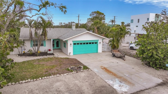 single story home featuring a garage